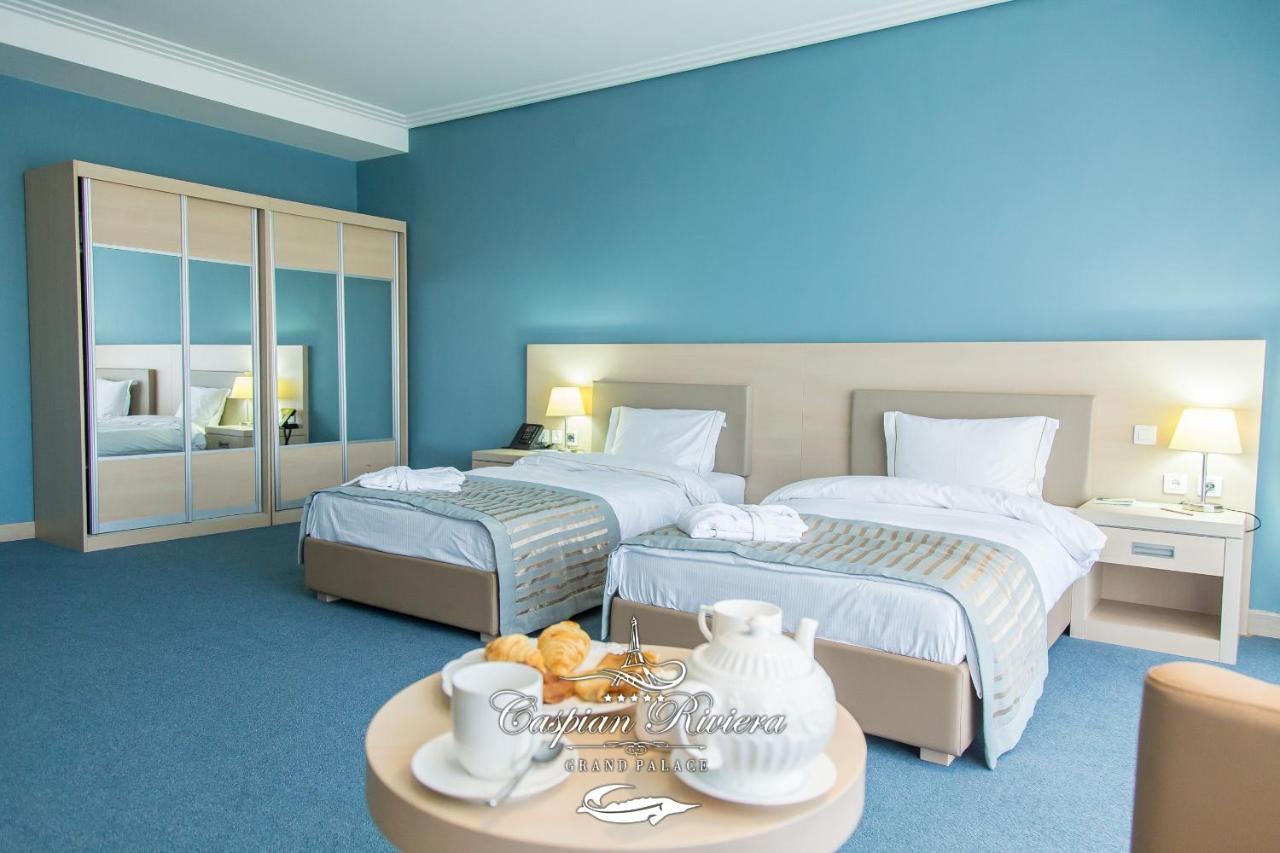 Caspian Riviera Grand Palace Hotel Ακτάου Εξωτερικό φωτογραφία A room at the hotel